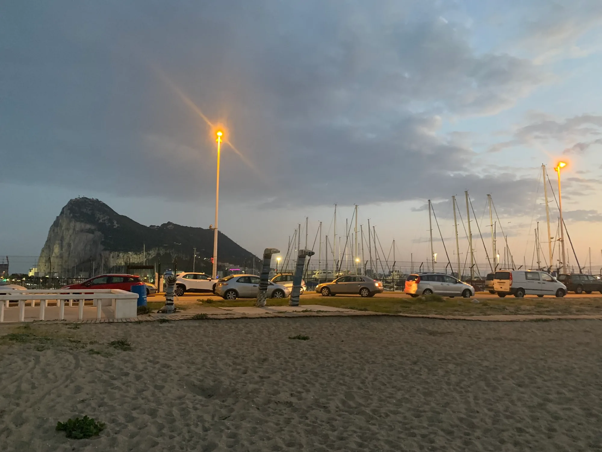 La Atunara fishing harbour with the Rock of Gibraltar in the distance
