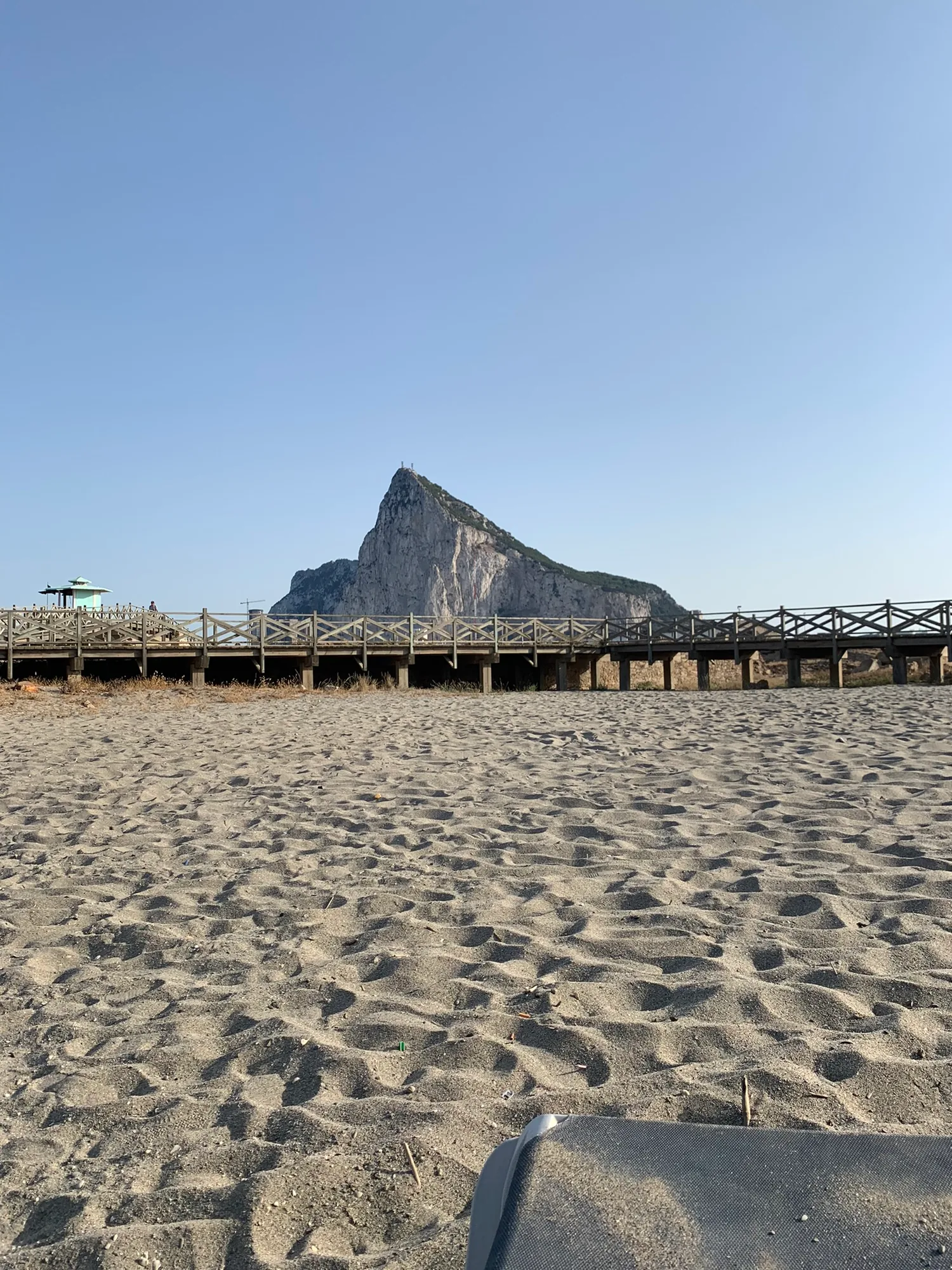 The boardwalk beside Playa de Levante in La Línea with the Rock of Gibraltar ahead
