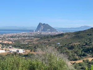 A wide view from the Sierra Carbonera mirador, with the Rock of Gibraltar and the bay laid out below.