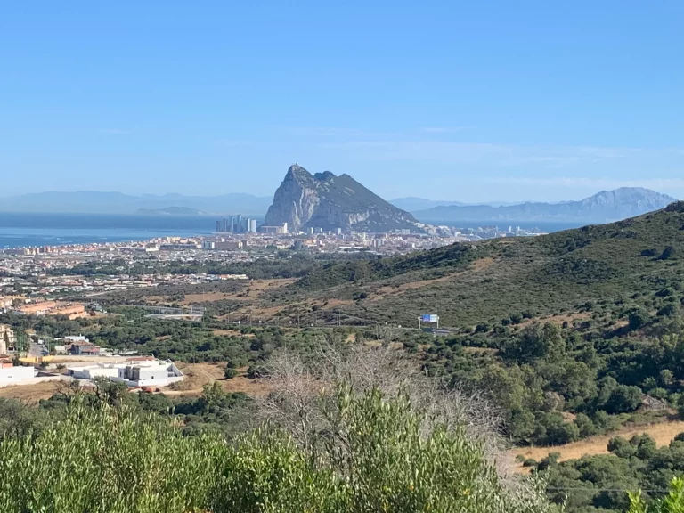 A wide view from the Sierra Carbonera mirador, with the Rock of Gibraltar and the bay laid out below.